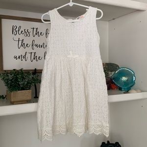 A white, kids dress.